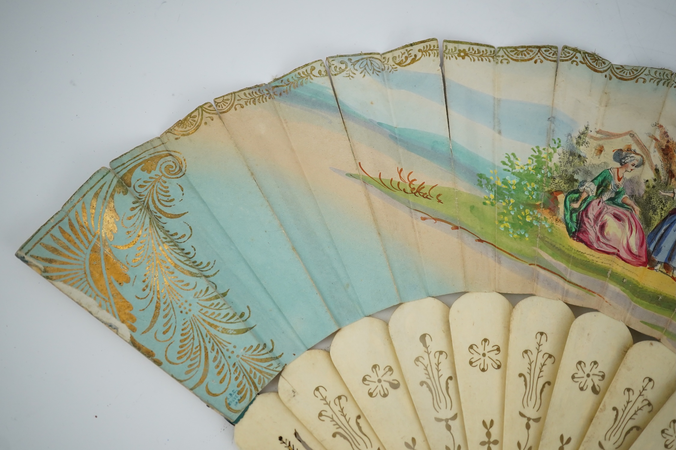 Three French fans: a mother of pearl and sequin fan boxed, a painted silk, feather and bone fan and a gilt decorated bone figural paper fan, the two bone fans having gilt mirrored mounts on the guards, figural paper fan